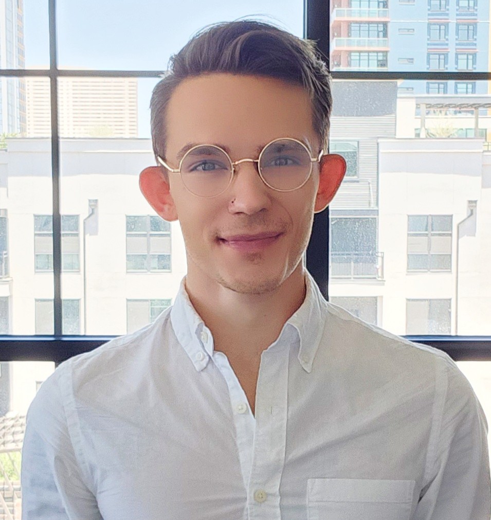Professional portrait of Adam Holman